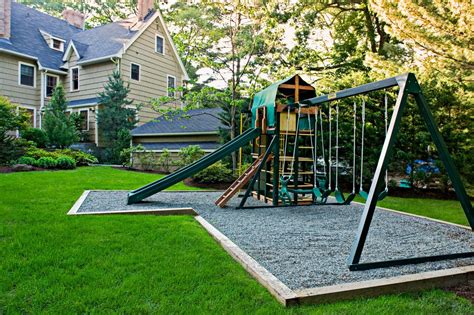 Build a playhouse for your kids that has a slide, steps, swings, a bridge, fort and plenty of room to hide and play. Backyard Playground Landscape Design Ideas - http ...