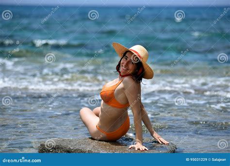 Bikini Tanning Woman Relaxing On The Beach With A Hat Stock Image Image Of Beauty Happy