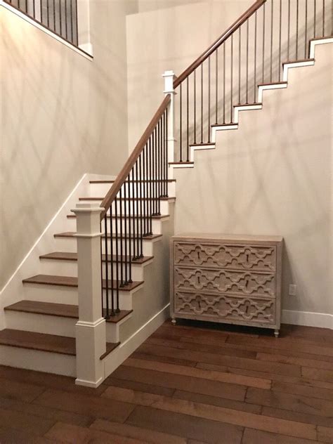 We carry both square and round steel spindles for stairs. Staircase Remodel 0132 - All Things Interior