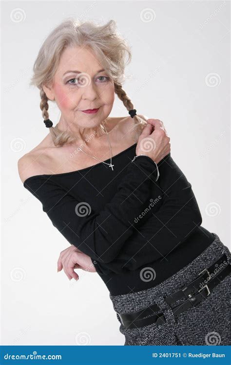 Mature Lady Using Lung Air Flow Monitor Royalty Free Stock Photo