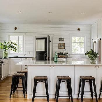 Farmhouse kitchen with stained and painted custom cabinetry. 755 Black and White Cottage Kitchens, Horizontal shiplap, black door, windows. | White cottage ...