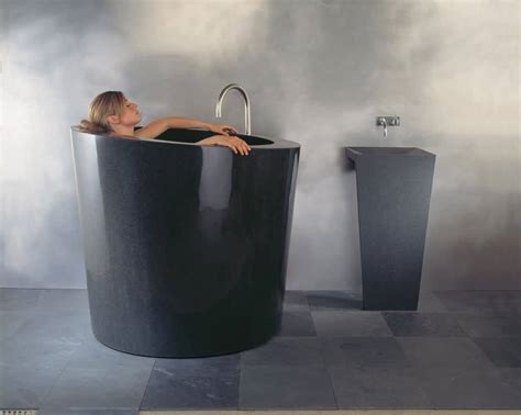 Insomnia, arthritis and blood pressure disorder can be treated by soaking on this tub. Soaking Tubs in Natural Stone by Stone Forest