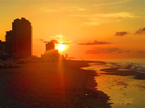 It's another smart way to protect the skin from the harmful effects of overexposure. OOOOrange BBBBeach, Alabama early morning sunrise ...