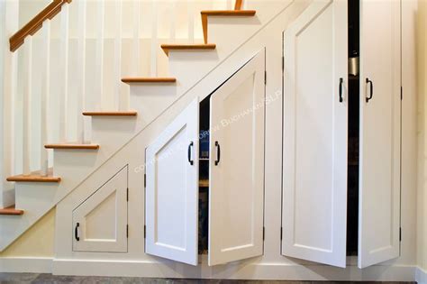 Reading nook or book storage under the stairs. under stair cabinet built ins | Custom cabinets built ...