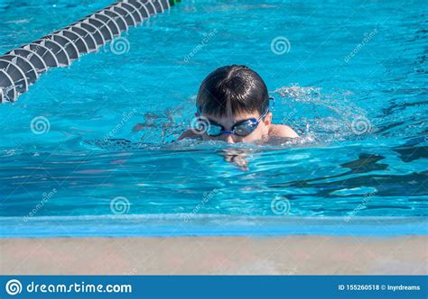 Young Man Swims Laps In A Swim Meet Stock Photo Image Of Active