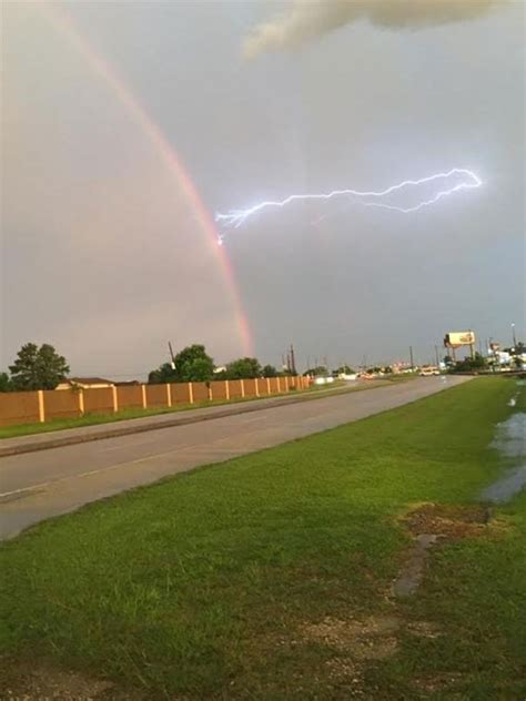 Lightning Striking A Rainbow And 10 More Perfectly Timed Photos That