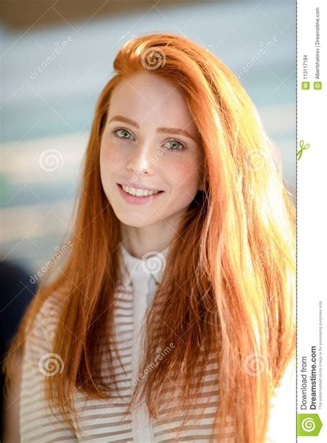 Ginger Female With Long Straight Shiny Hair And Natural