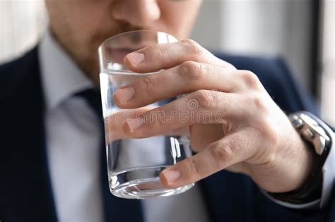 Close Up Confident Businessman Drinking Fresh Pure Mineral Water Stock