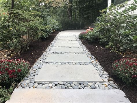 Add Style To Your Paver Patio And Walkway With Pebbles And Rocks In