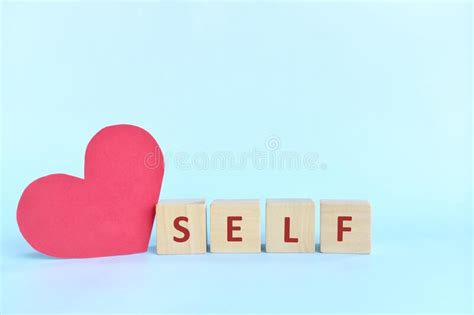 Self Love And Care Concept Wooden Blocks Typography With Big Red Heart