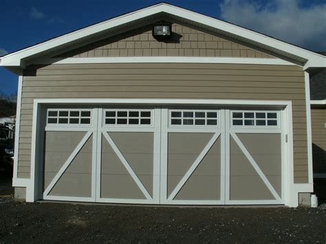 Courtyard garage doors with Stockton trim designs in White and ...