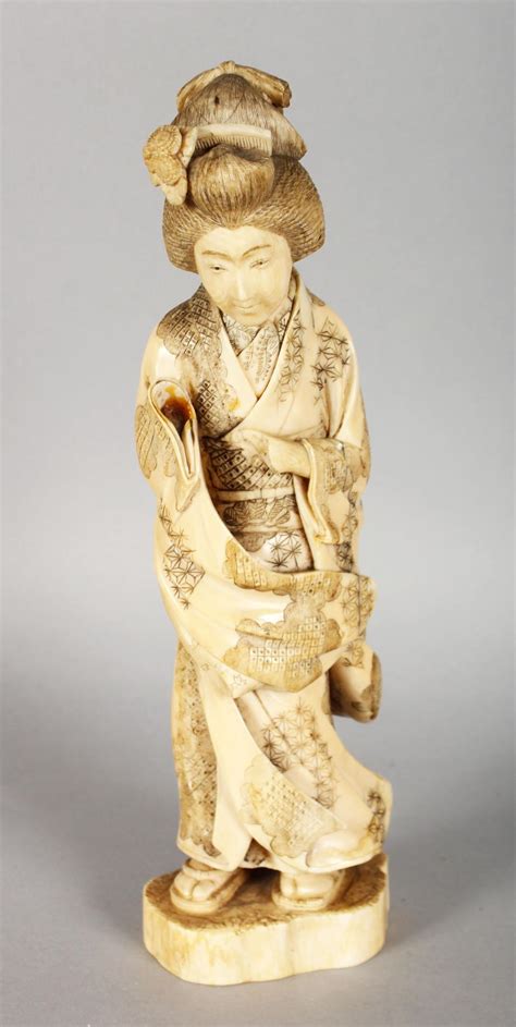 A Japanese Carved Ivory Figure Of A Geisha 11ins High