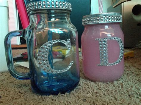 Standard mason jar planters have met their match, thanks to these decorative book page birds and white chalk paint base. Mason jar with glitter and rhinestone initial | Glitter mason jars, Diy arts and crafts, Mason jars