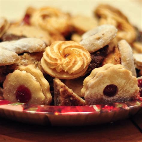 Place the coated cookies on a wire rack to finish cooling. A plate of Christmas cookies from Austria... | Cookies ...