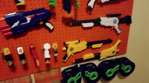 Here is a real simple diy nerf gun storage rack system for under $$20.00 bucks. DIY AWESOME $40 Nerf Gun Rack! - YouTube