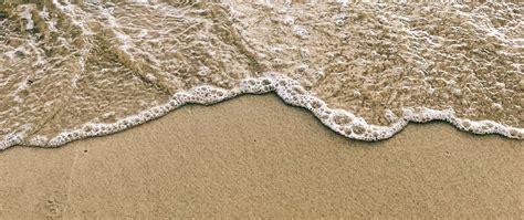 Download Wallpaper 2560x1080 Beach Sand Tide Coast Dual Wide 1080p
