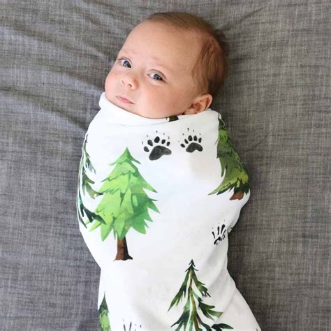 Baby Boy Swaddled Up In Our Woodland Trees And Track Oversized Knit