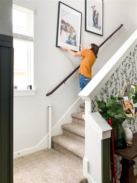 How To Hang Photos On Your Staircase Love And Renovations Diy Stairs