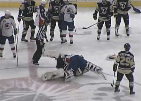 Ahl Hockey Goalie Fight At Center Ice