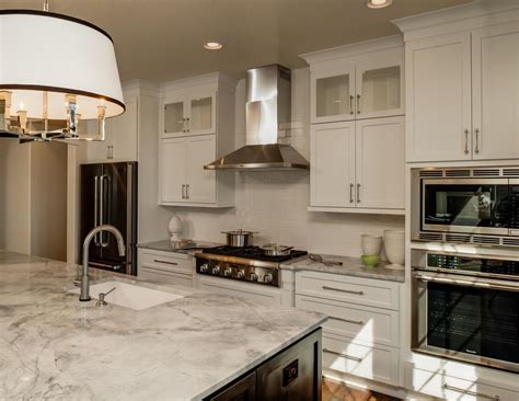 The combination of raised white framing on the facade coupled with dovetail drawer boxes adds to the uptown white shaker collection's ability to make your space appear larger and. Shaker Kitchen Cabinets: Shake it up!