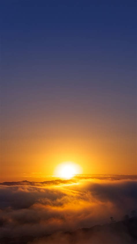 Download Wallpaper 1350x2400 Sunset Mountains Clouds Sun Horizon