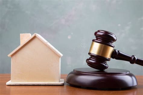 Real Estate Sale Auction Concept Gavel And House Model On The Wooden