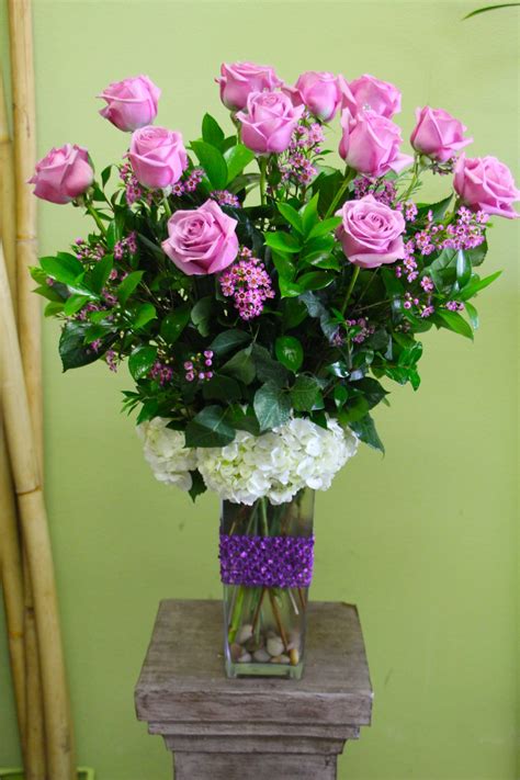 Lana Dozen Long Stem Lavender Roses In A Tall Vase In Torrance Ca