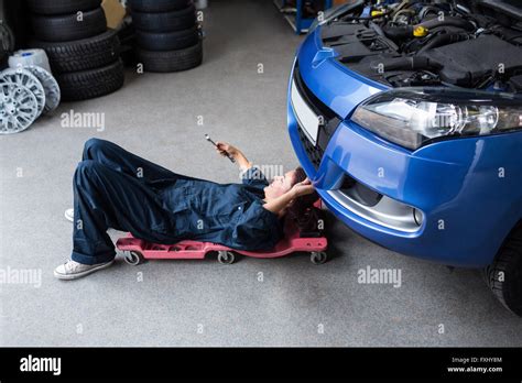 Female Mechanic Repairing A Car Stock Photo Alamy