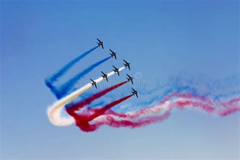 Aerobatic Team Group Of Fighters Jet Flies In The Sky With Brightly