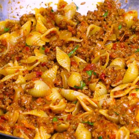 This Is A Closeup Photo Of Cheesy Taco Pasta Made With Small Shell