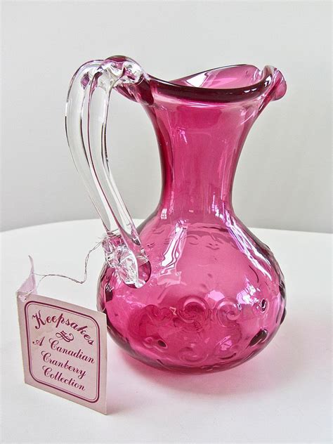 7 Double Handled Cranberry Glass Pitcher With Hearts And Swirls By Keepsakes Made By Rossi