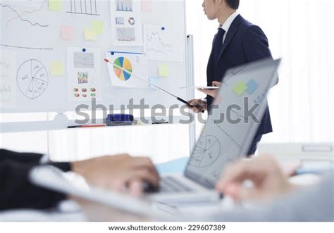 Businessmen Presentations Using Charts Stock Photo 229607389 Shutterstock