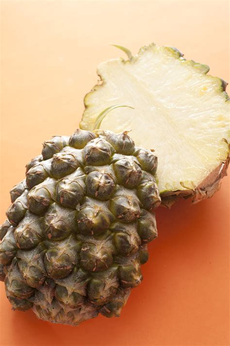 Free Image Of Vibrant Fresh Sliced Pineapple Halves Freebiephotography