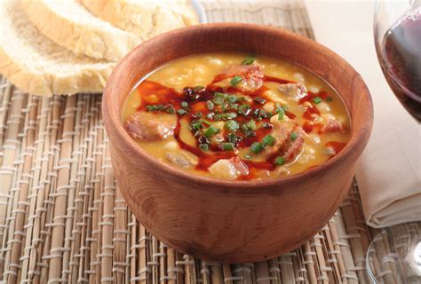 Locro is a thick hearty soup traditionally made with corn and other vegetables and meats that the local people had to use around them. Locro - Egran