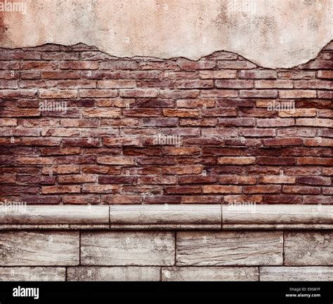 Old Grungy Brick Wall With Peeled Off Stucco Rustic Texture Background