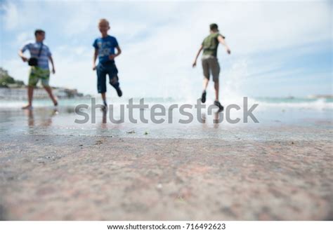 Three Little Boys Run Away Surging Stock Photo 716492623 Shutterstock