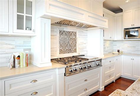 When designing a kitchen with inset cabinetry, planning out how to combine cabinets where possible will create a seamless look. Inset Kitchen Cabinets