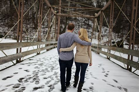 Man And Woman Standing On Snow Covered Ground · Free Stock Photo