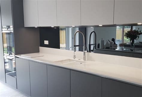 Collection by concept tiles toowoomba concept tiles toowoomba. Grey mirrored glass kitchen splashback complementing this ...