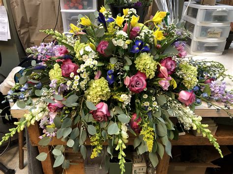 Express your deepest condolences for the dearly departed with our large selection of reasonably priced, tastefully designed, casket sprays. Colorful Casket Spray | Casket sprays, Funeral basket, Flowers