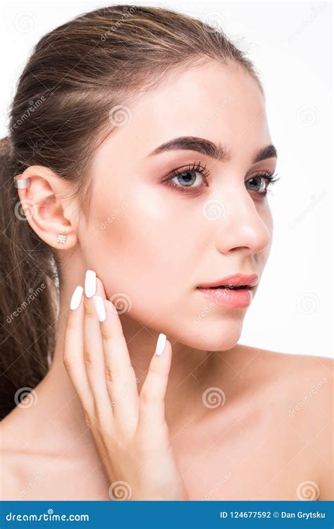 Closeup Beauty Girl Face With Natural Nude Makeup And Clean Skin Isolated On White Background