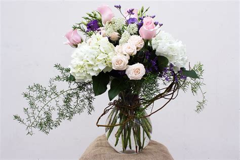 Bubble Bowl Arrangement Made With White Hydrangeas Pink Roses