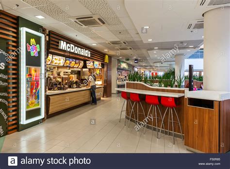 Charlie skabelund, 5, really wanted a happy meal, so he phoned in his o. McDonald's restaurant inside of Flora commercial center in Prague Stock Photo: 89143381 - Alamy