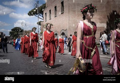 Roman Ladies Parade In A Historical Reenactment In April People Performing A Roman Legion At