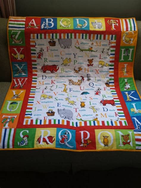 In this quilting quickly quilting video tutorial, the fons & porter staff show you how to put together variations that make up the quilt, . My ABC quilt | Baby quilt panels, Alphabet quilt, Panel quilt patterns