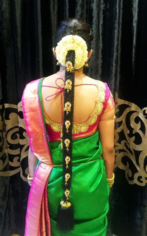SouthIndian Simple #‎BridalHairstyle‬ | Indian bride ... Long top layers are swept to one side and tucked behind the.
