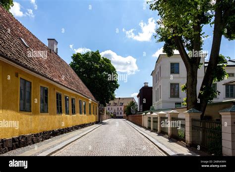 Lund Sweden June 24 2018 An Old Crooked Yellow House Next To A