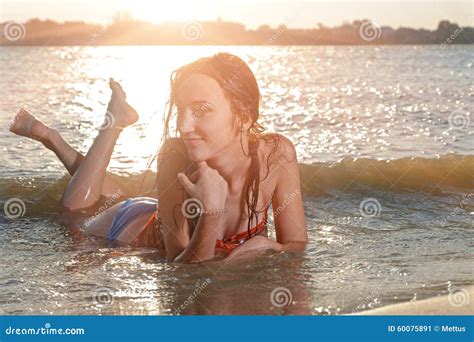 Smiling Beautiful Woman In Bikini Lying On A Beach Stock Image Image