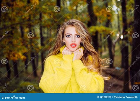 Beautiful Autumn Woman With Autumn Leaves On Fall Nature Background