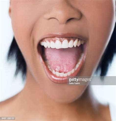 Black Woman Open Mouth Photos And Premium High Res Pictures Getty Images
